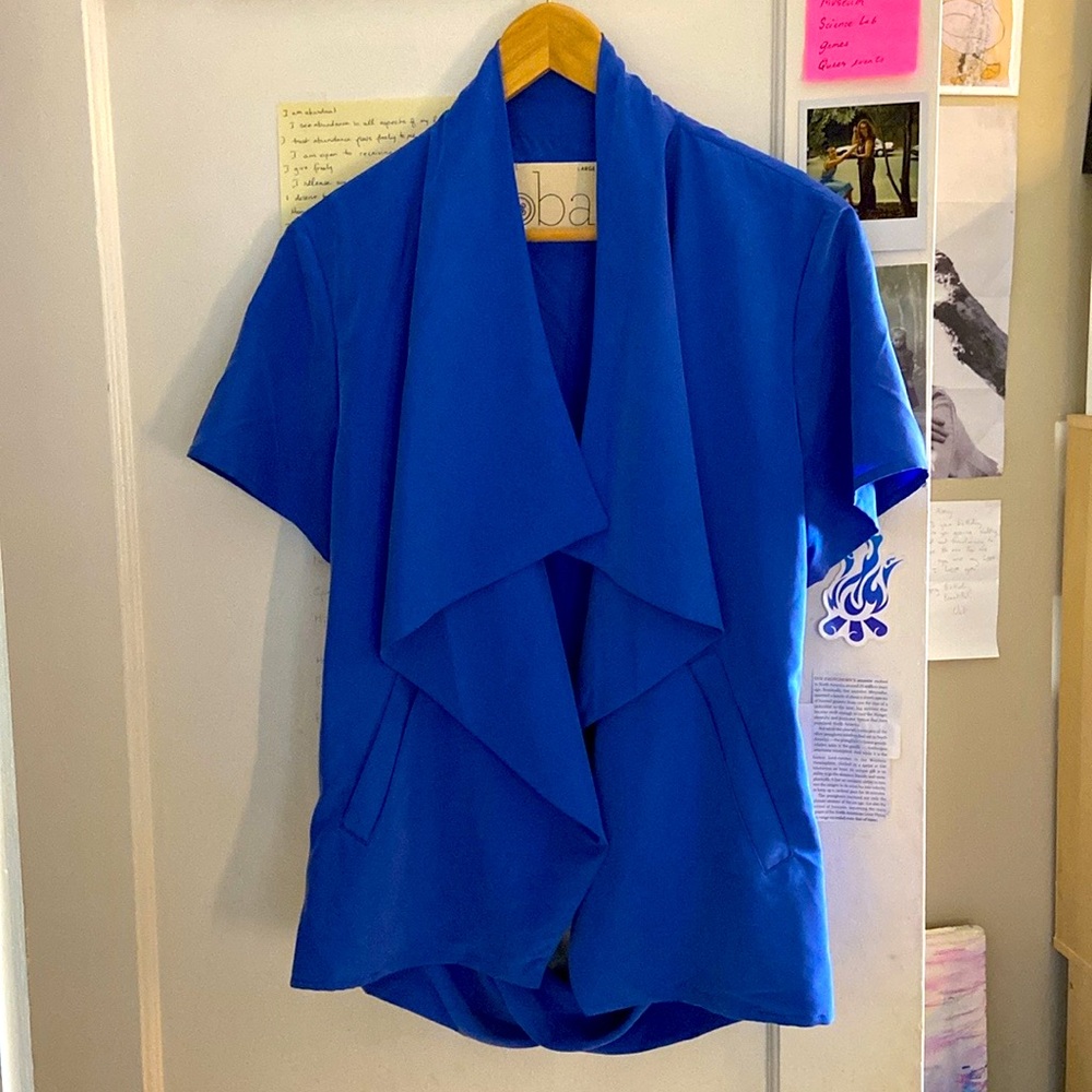 Unique blue short sleeve blazer by Shanghai Indie designer. Silk feel.